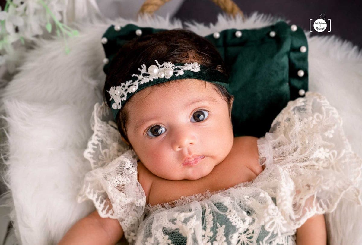 Award-winning newborn and baby photography hero image from Priyansh Bhardwaj Photography studio in Delhi NCR.